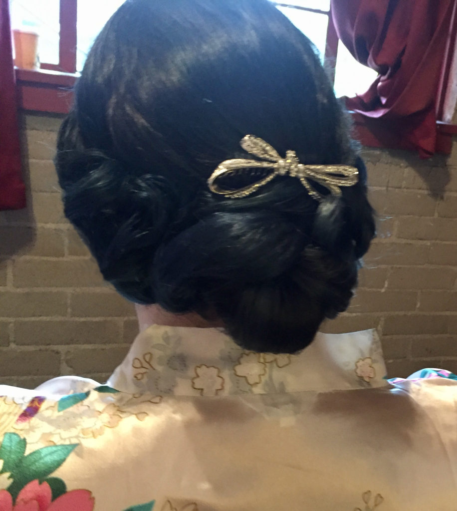 photo of vintage style updo blue hair