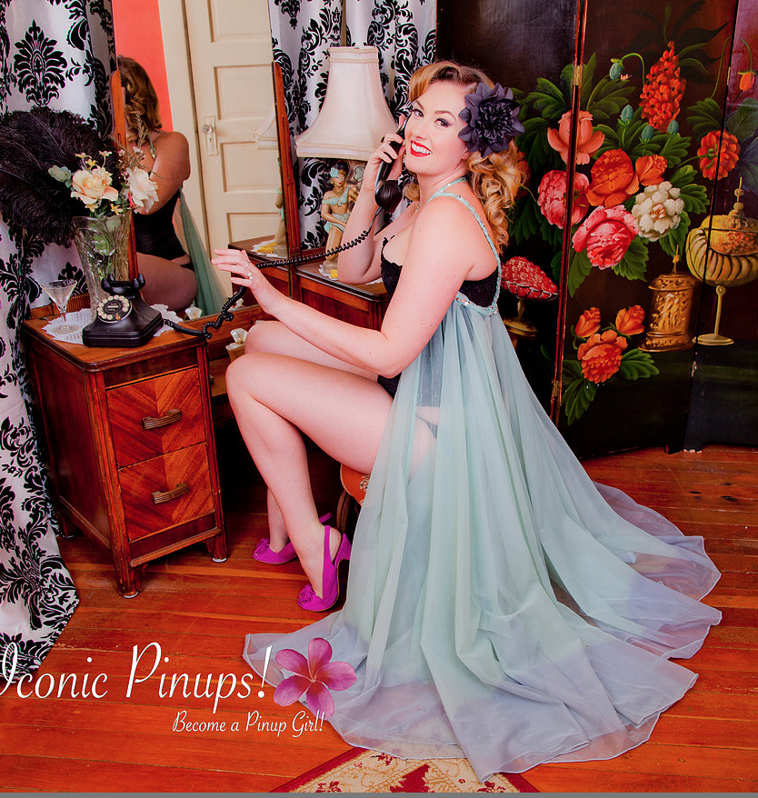 Burlesque style pinup photo shoot with pinup girl. She has vintage makeup and hair