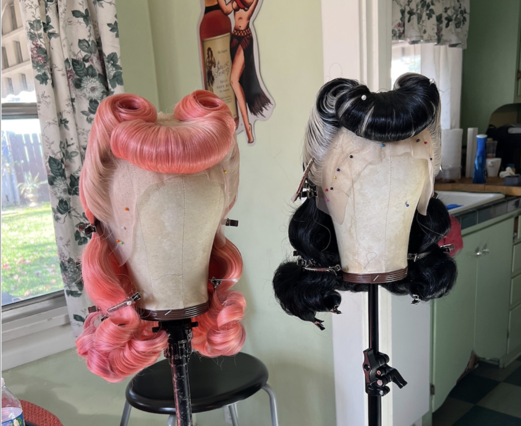 Wigs with bumper bangs and victory rolls